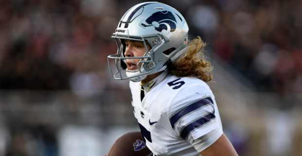 Kansas State Wildcats quarterback Avery Johnson on a rushing attempt during a college football game in the Big 12.